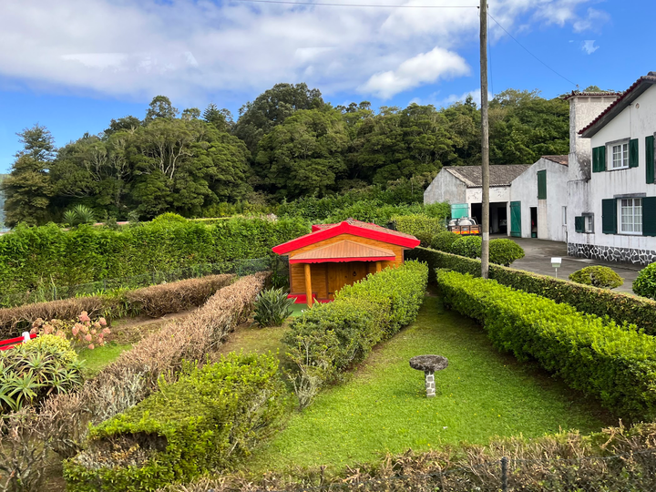 Small red building with a 2ft tall door